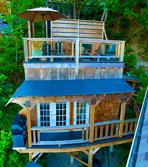 Tiny Cabin with private rooftop and outdoor shower on the right.