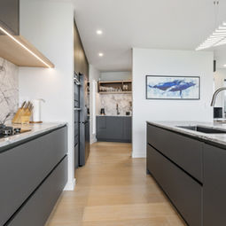 Built By Dre 
Castor Bay renovation kitchen. Kitchen by Guyco Kitchens, stone by CDK, fabricator Ora Stone