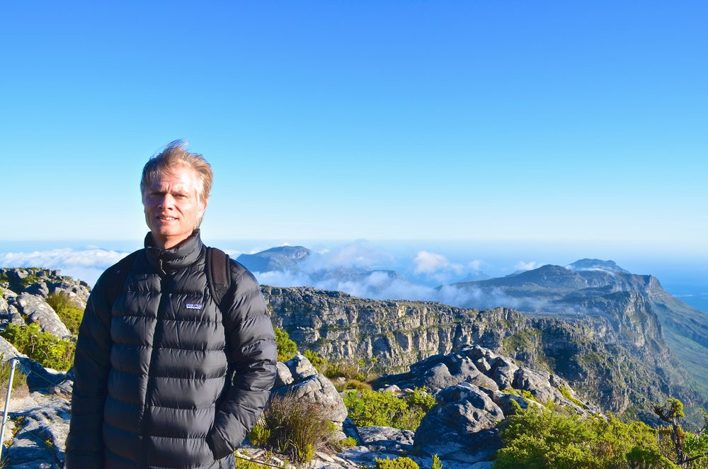 Rob Feakins At The Top Of A Mountain Range