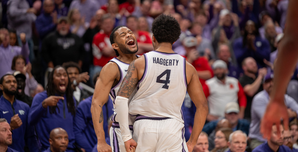 David Castillo and PJ Haggerty bump chests after scoring.