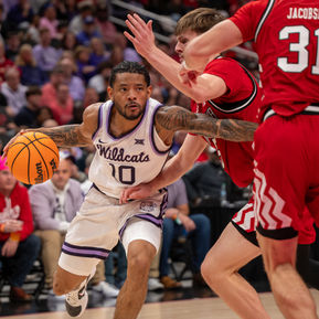 David Castillo dribbles the ball past a Nebraska defender.
