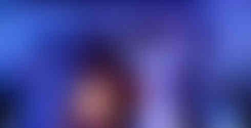 An Inflatable pumpkin and ghost halloween decoration.