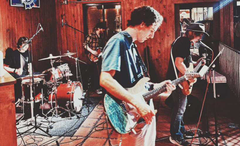 Woodridge performs in the back of yard bar outside. Courtesy: Peter Wallace