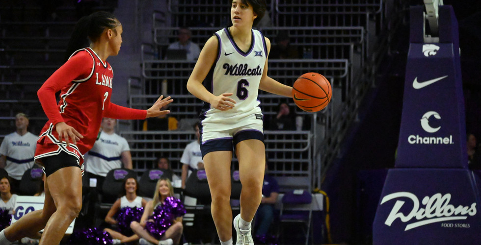 Gina Garcia dribbles the ball down the court in Bramlage Coliseum.