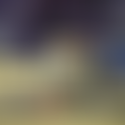 K-State basketball huddles up on the court.