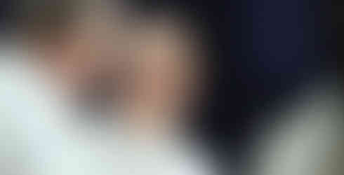 Jeff Mittie talks to one of his coaches during a timeout.