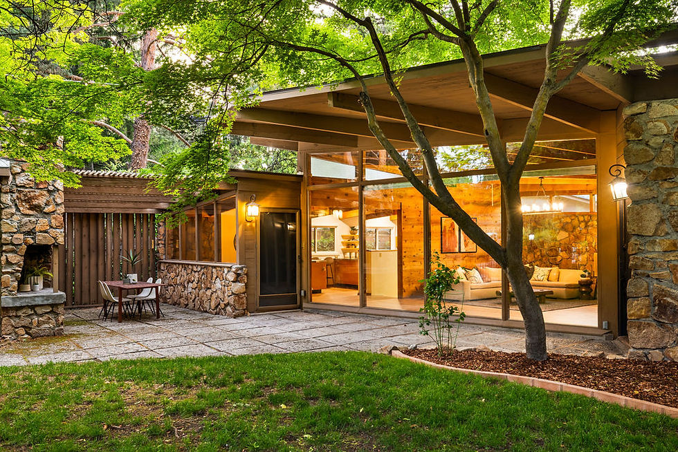 Lush gardens and mature trees frame the Sundial House’s iconic floor-to-ceiling windows, blurring the boundary between indoor serenity and outdoor splendor—a defining hallmark of mid-century modern design. Photos courtesy of Abby Blossom.