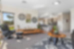 Immaculate, contemporary living room with elegant decor and a fresh ambiance, meticulously maintained by Tidy Delights.