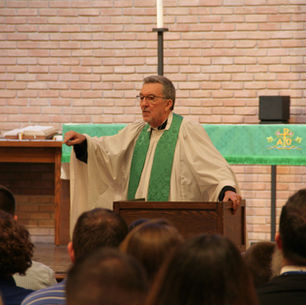 pastor delivering a sermon at a lectern