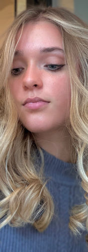 Girl with long beach blonde hair and beach waves