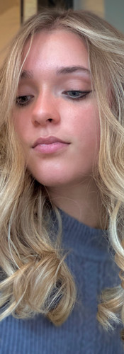 Girl with long beach blonde hair and beach waves