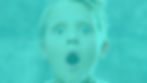 Shocked boy in green.jpeg