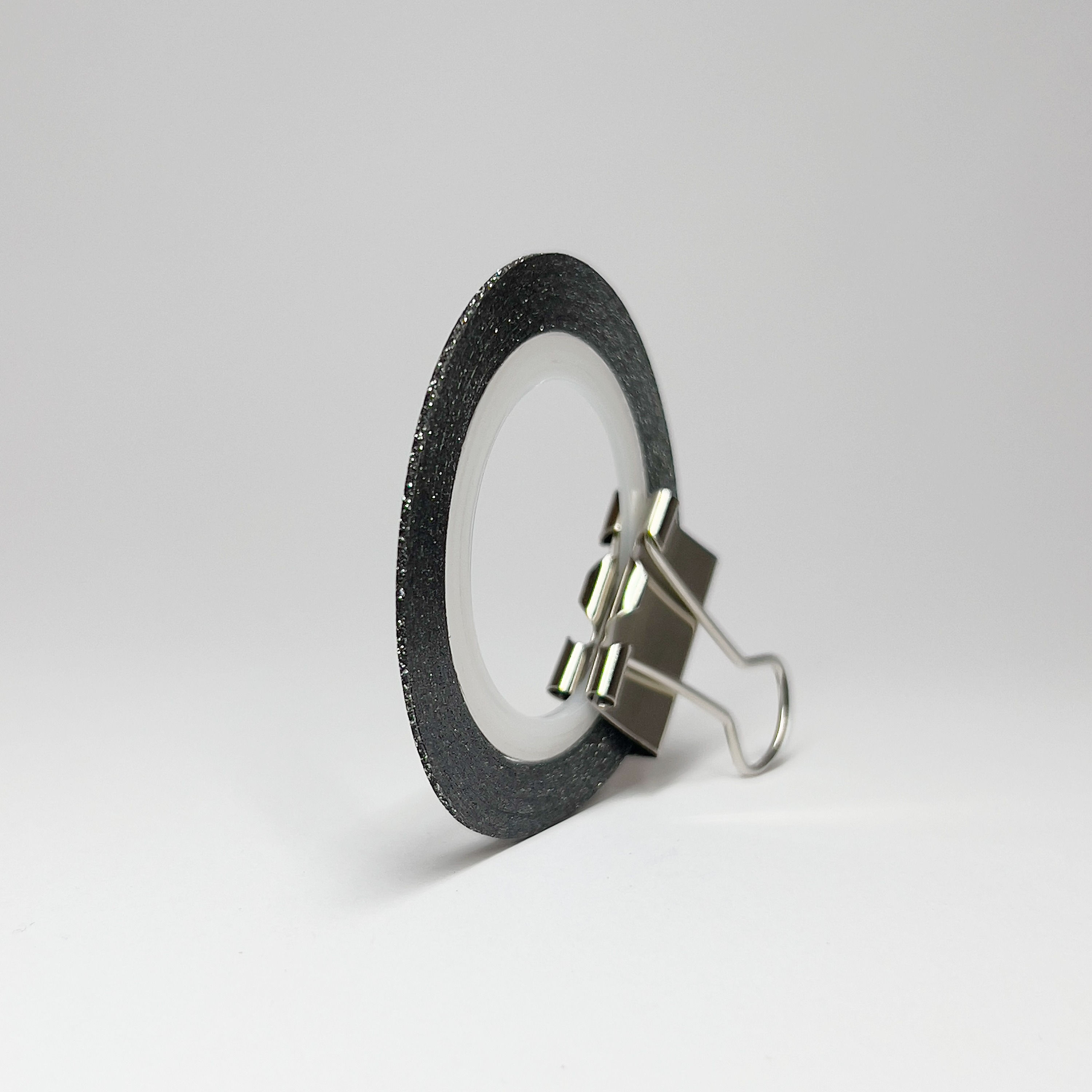 Designteippi. Glitteri. Musta 1mm