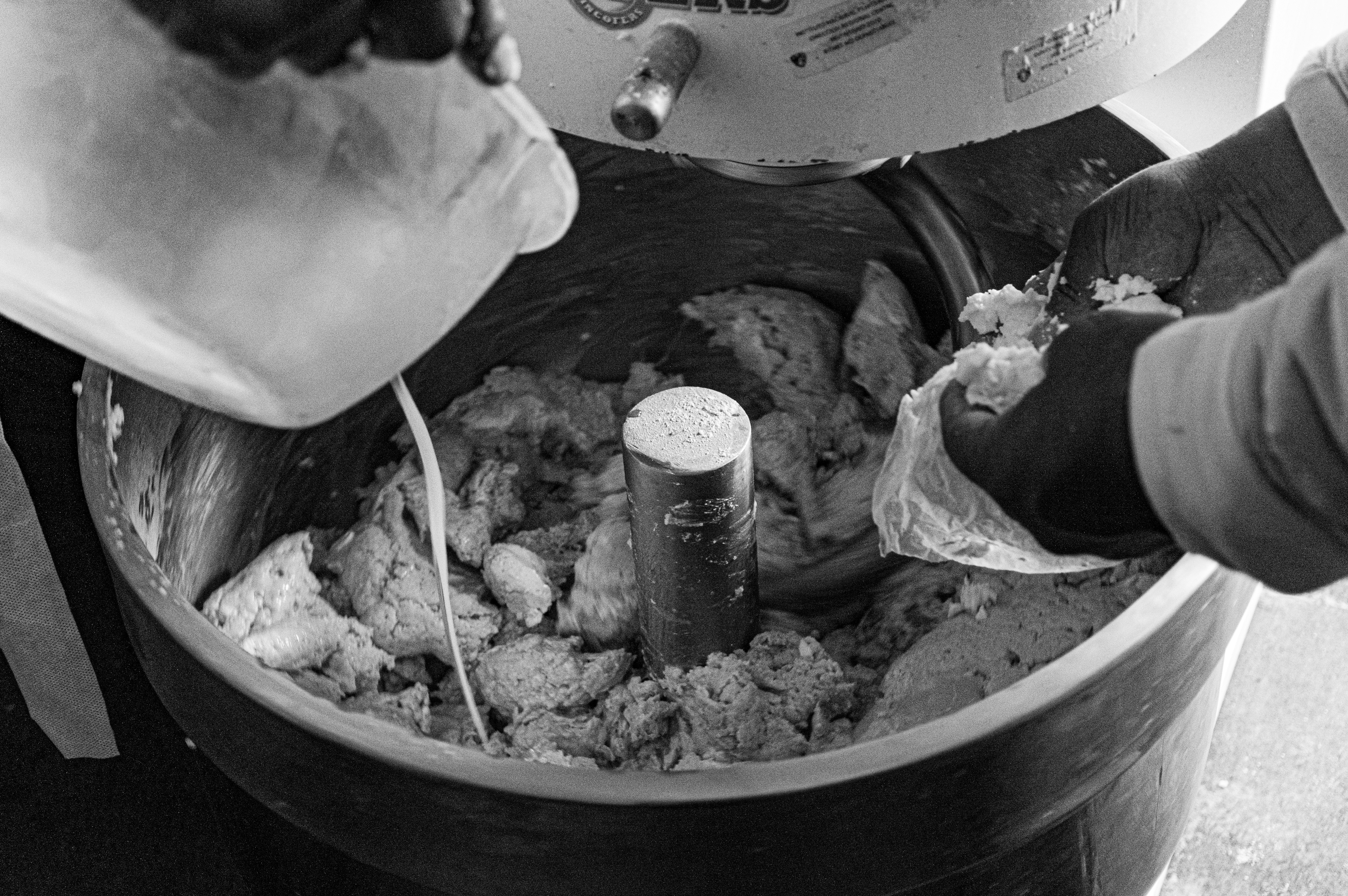 Fresh noodle dough being mixed during production at Chay Han Kee in Malaysia