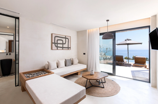 KOIA room sitting area with sea view