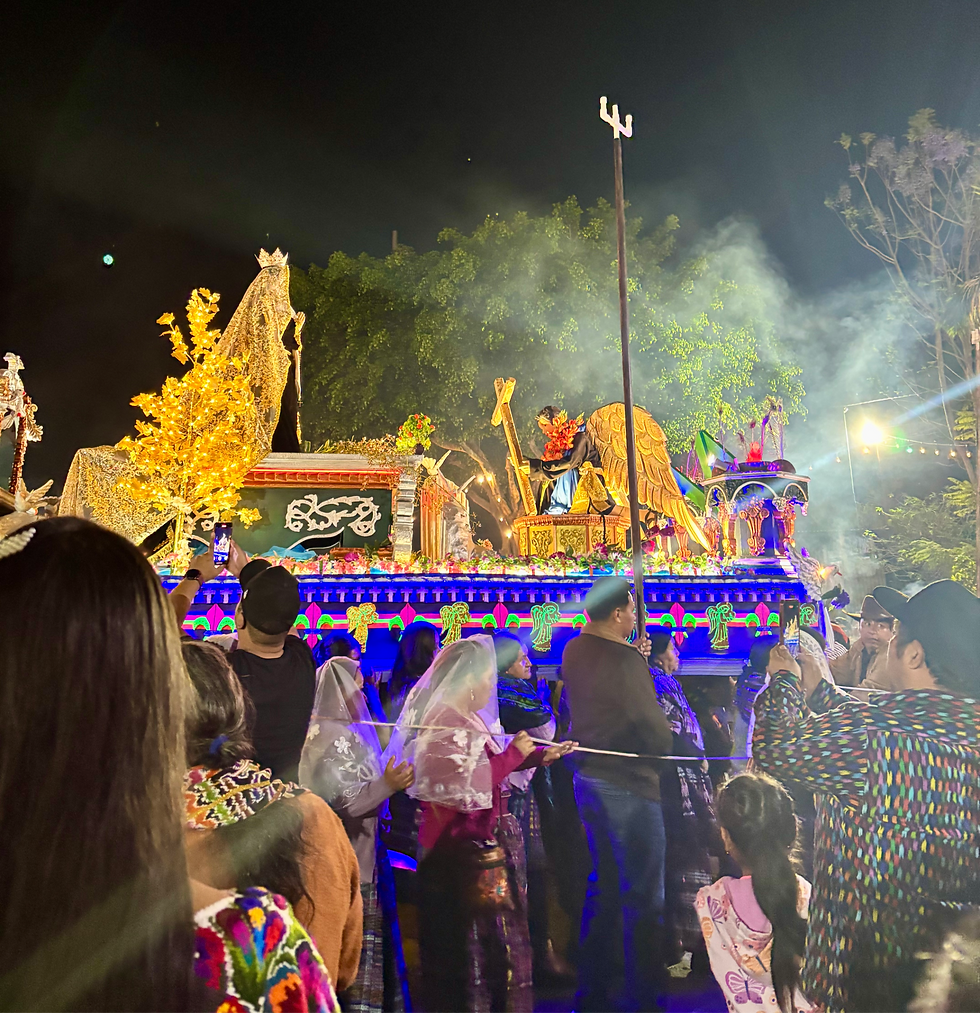 the local women carrying the big heavy float thing