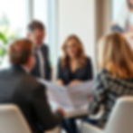 a group of people in a conference room