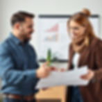 marketing growth strategy discussion man and woman looking at plan