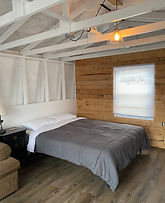 Queen bed in the bunkie