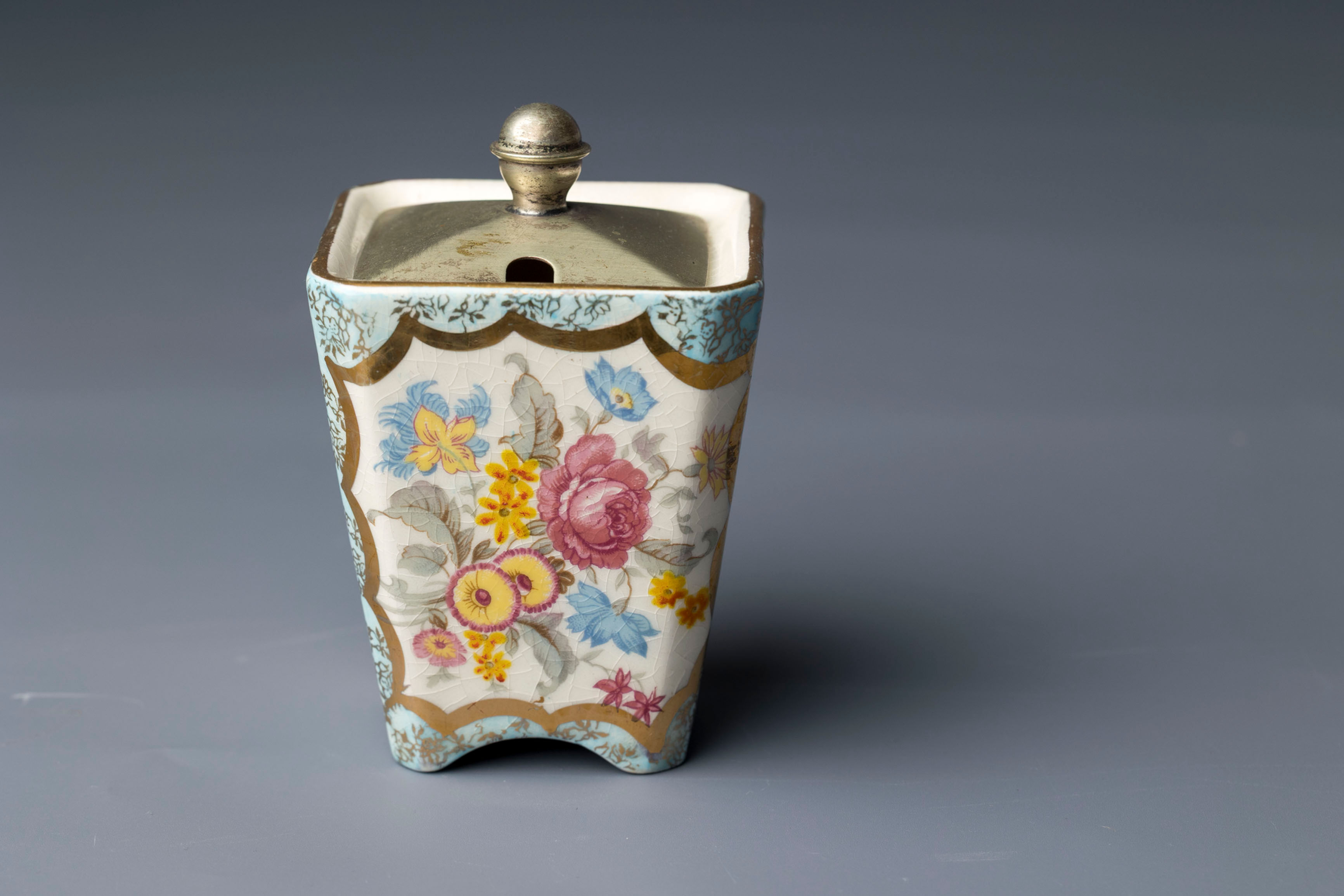 This is a mid-century preserve or mustard pot by Lancaster & Sandland, produced for Yeoman Plate. The square bodied ceramic