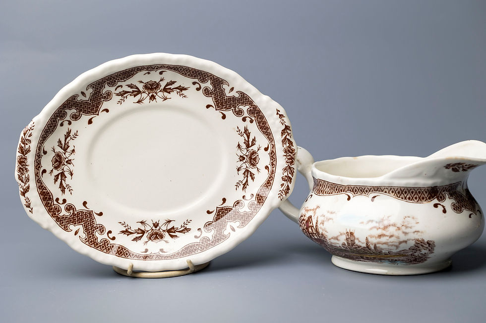 This English gravy boat with underplate is from the Scenes After Constable series, produced by W.H. Grindley, a notable Staff