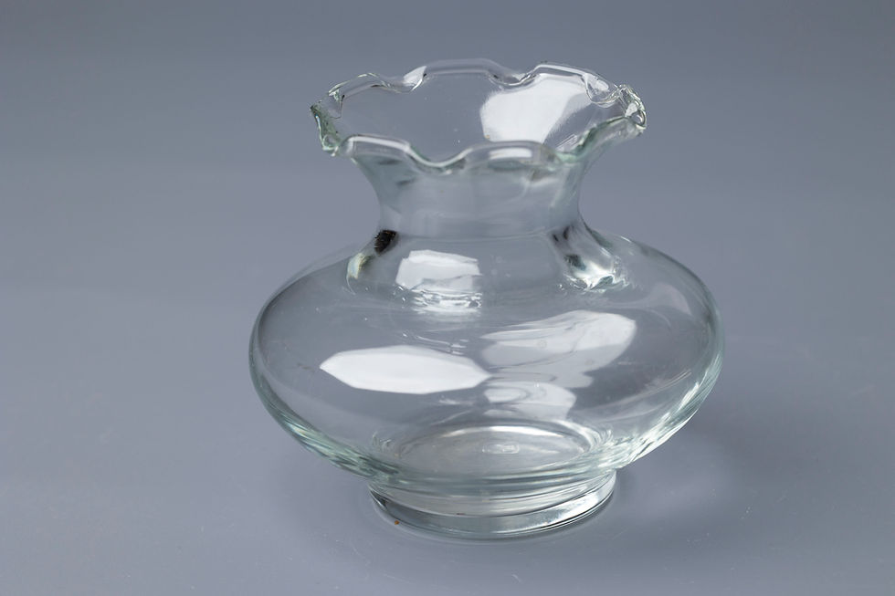 Flared Petal Type: Clear glass bud vase with flared petal rim Year: Circa 1950s–1970s
