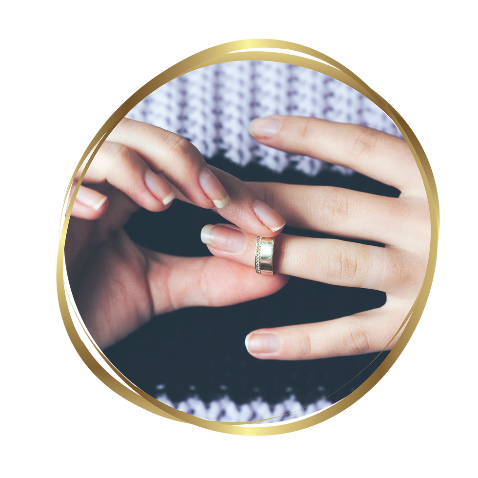 Woman taking off wedding ring