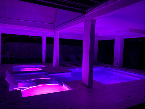 pool with lights at night