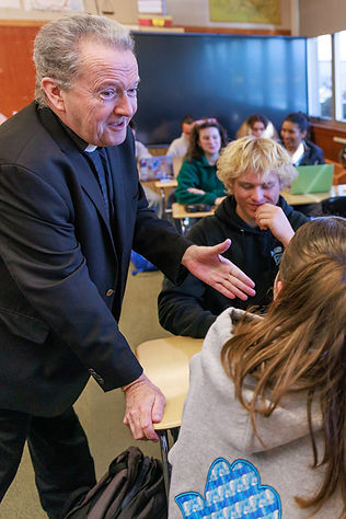 Father Jim Sullivan teaching