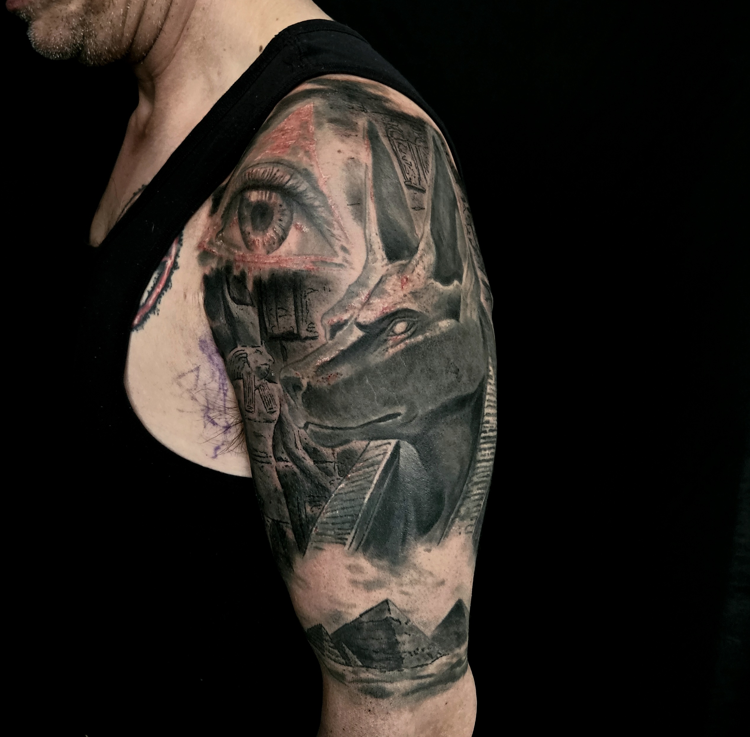 Atmospheric dark portrait tattoo of a woman in profile