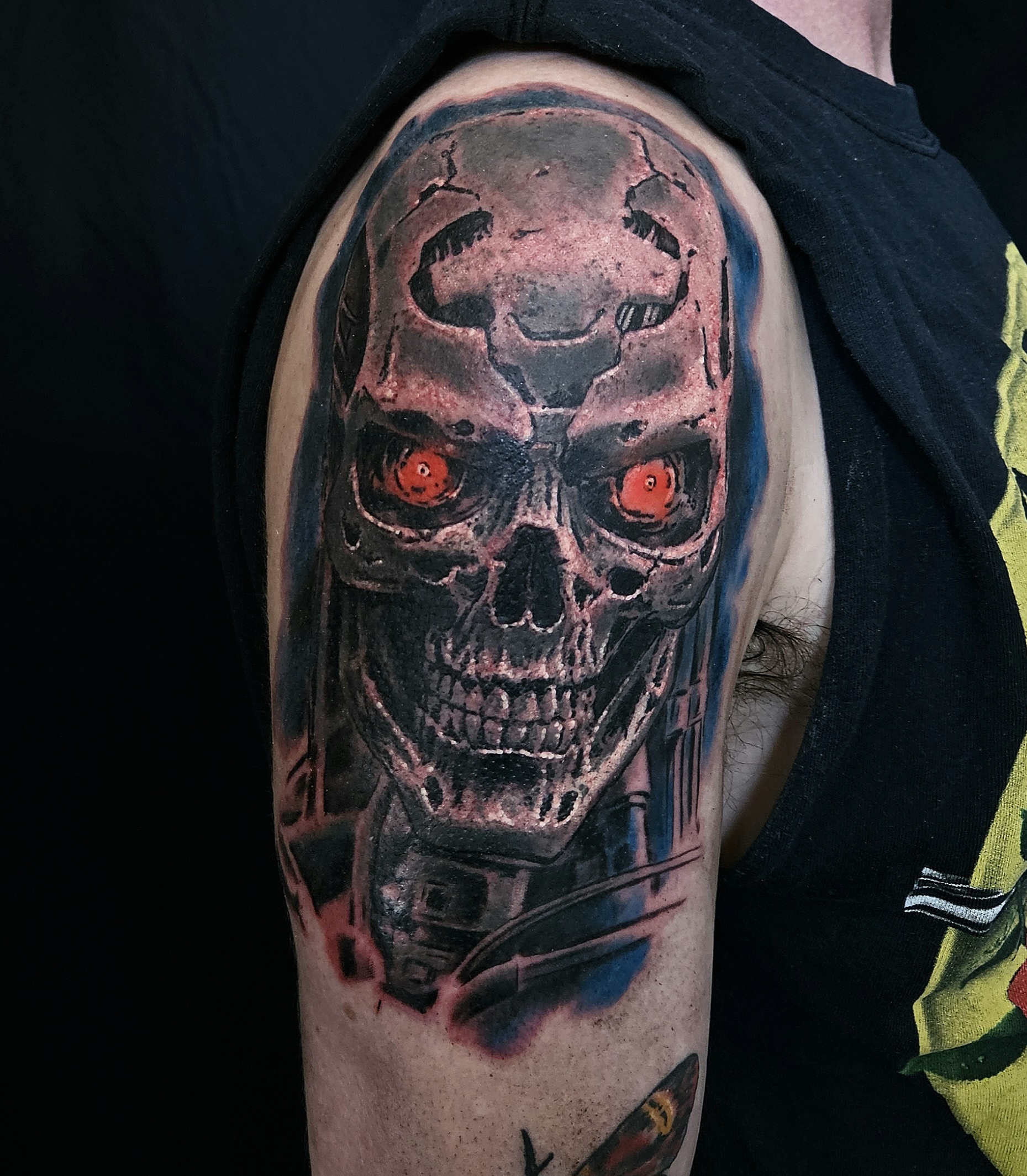Colour realism Terminator skull tattoo