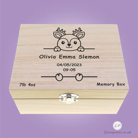 A wooden memory box with an engraved deer illustration, the name Olivia Emma Slemon, date 04/05/2023, time 09:05, weight 7lb