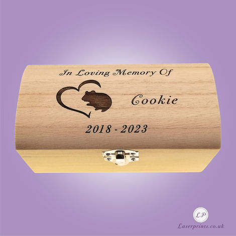 A wooden memory box engraved with In Loving Memory Of Cookie 2018-2023, featuring a heart with a pet hamster silhouette and a