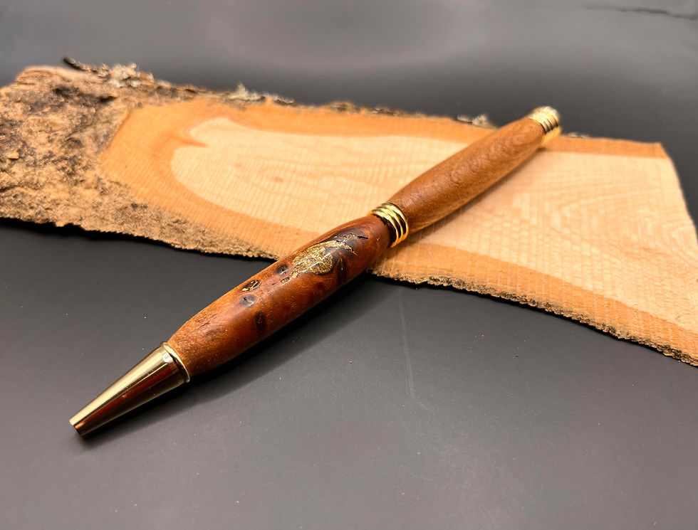 Yew with gold inlay turned pen