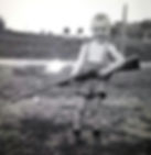 Young Melvin Rowe with his gun