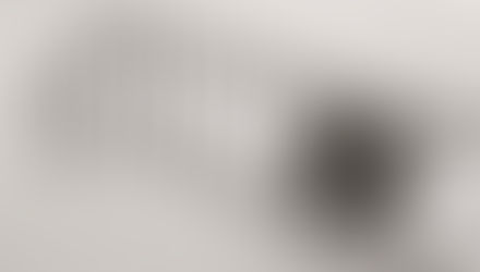 Fresh snow on a porch railing