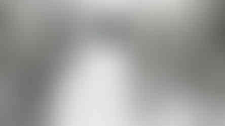 A ski lift in between sno covered trees in Claviere, Italy