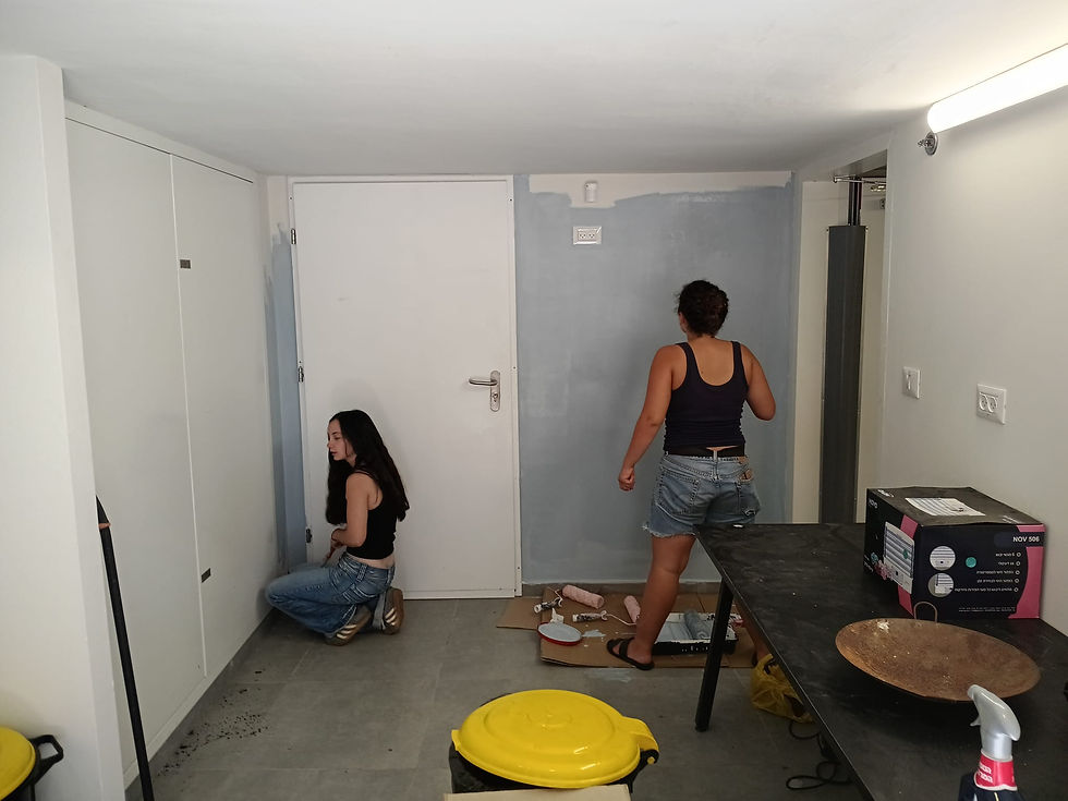 Students helped paint and prepare their new building in Tel Aviv ahead of the school year.