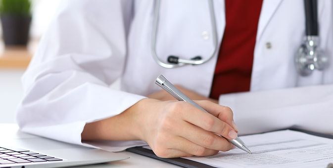 Doctor checking transcribed notes