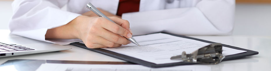 Doctor Checking a Form
