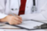 Doctor Checking a Form