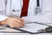 Doctor Checking a Form