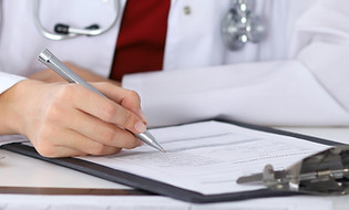 Doctor Checking a Form