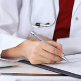 Doctor Checking a Form