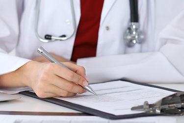 Doctor Checking a Form