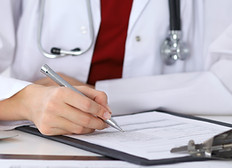 Doctor Checking a Form