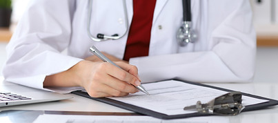 Doctor Checking a Form