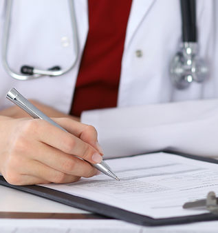 Doctor Checking a Form