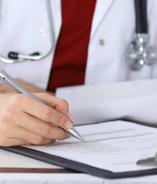 Doctor Checking a Form