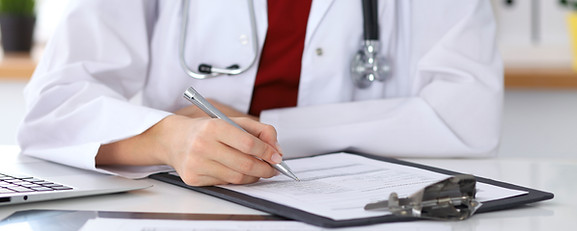 Doctor Checking a Form